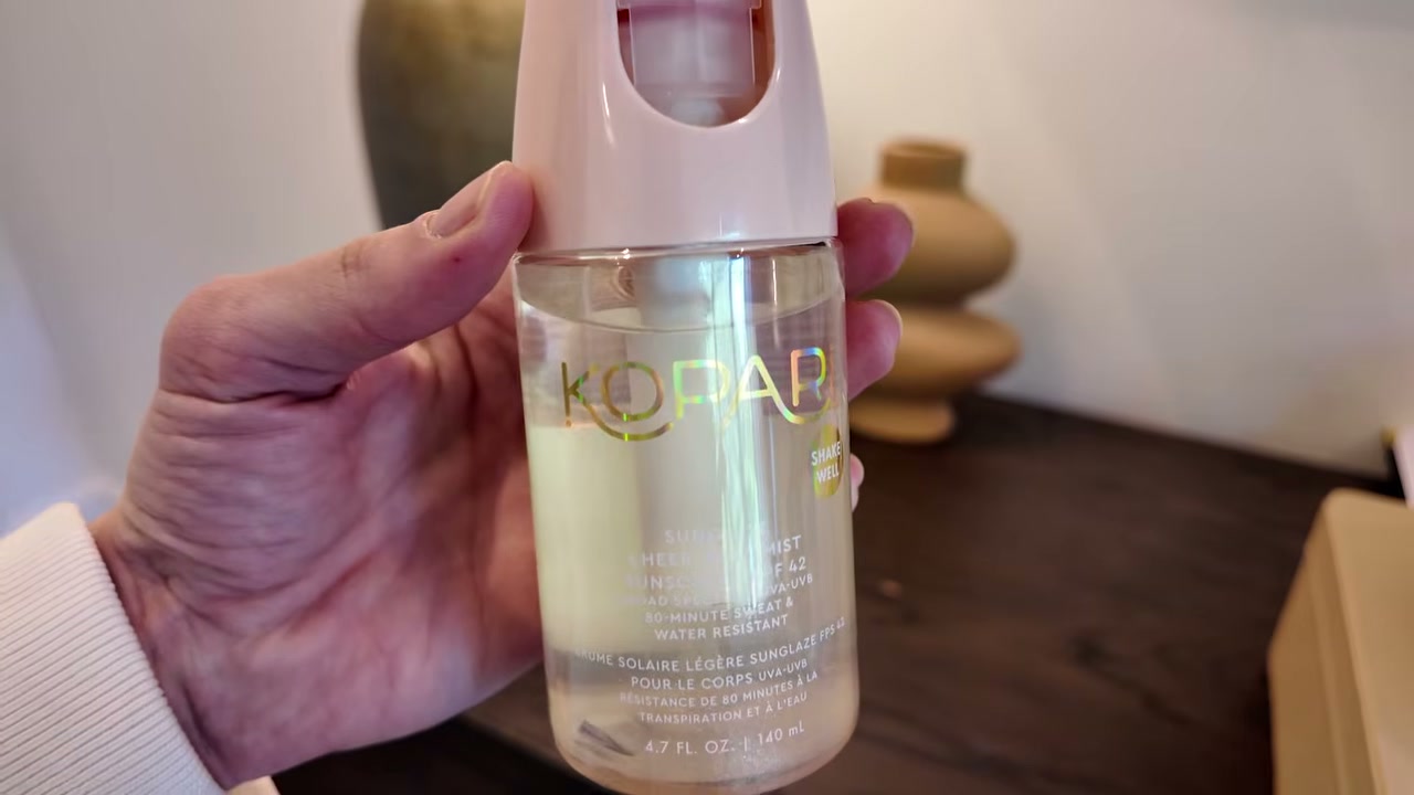 @moriahcrobinson reviewing Kopari Beauty Sheer Body Mist SPF at 10:19 in a YouTube Shorts video