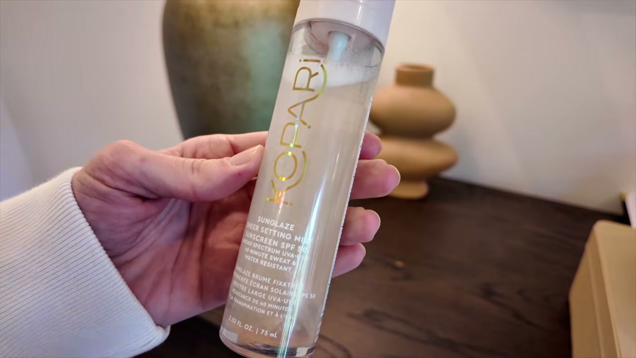 @moriahcrobinson reviewing Kopari Beauty Sun Glaze Sheer Setting Mist at 10:52 in a YouTube Shorts video