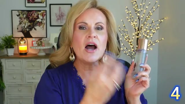 @mrsmelissam reviewing Charlotte Tilbury Airbrush Flawless Setting Spray at 07:13 in a YouTube Shorts video