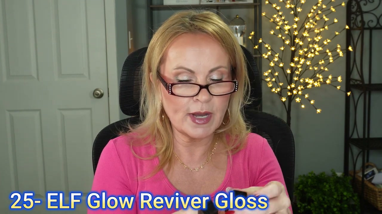 @mrsmelissam reviewing e.l.f. Cosmetics Glow Reviver Lip Oil Glimmer at 23:06 in a YouTube Shorts video