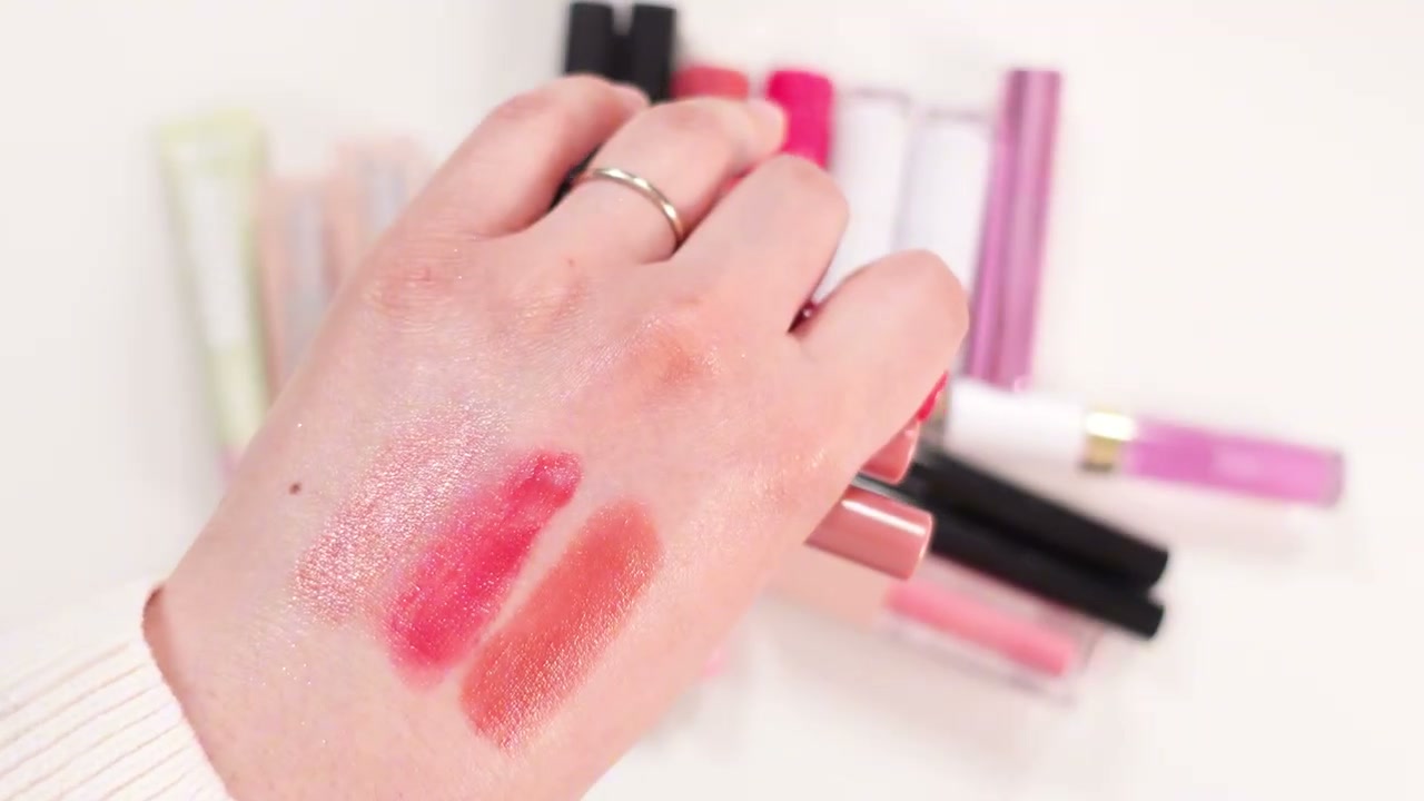 @ms.angiekim reviewing Burt's Bees Lip Shimmer at 14:44 in a YouTube Shorts video