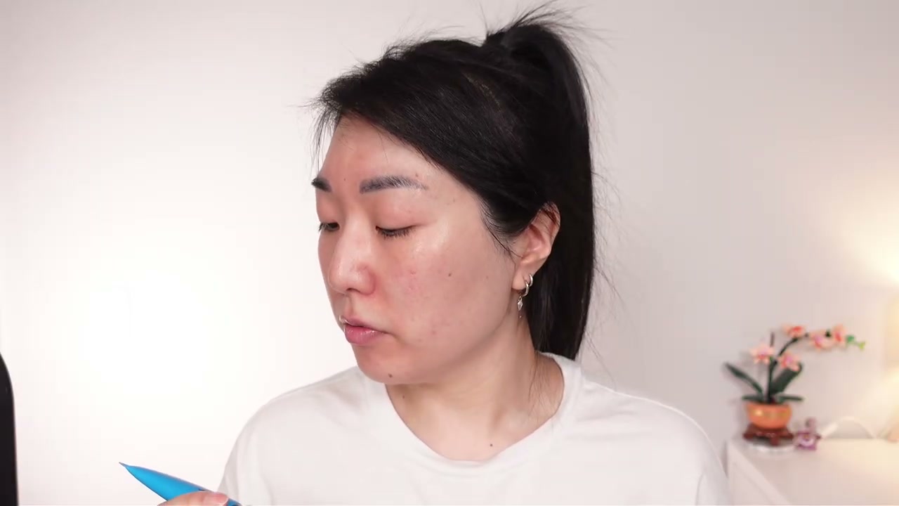 @ms.angiekim reviewing e.l.f. Cosmetics Glow Reviver Melting Lip Balm at 01:27 in a YouTube Shorts video