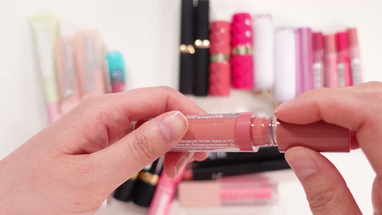 @ms.angiekim reviewing e.l.f. Cosmetics Sun Boss Gloss at 13:28 in a YouTube Shorts video