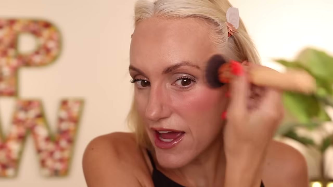 @pamperedwolf reviewing Makeup Revolution Bouncy Pudding Cheek and Lip Tint at 21:42 in a YouTube Shorts video