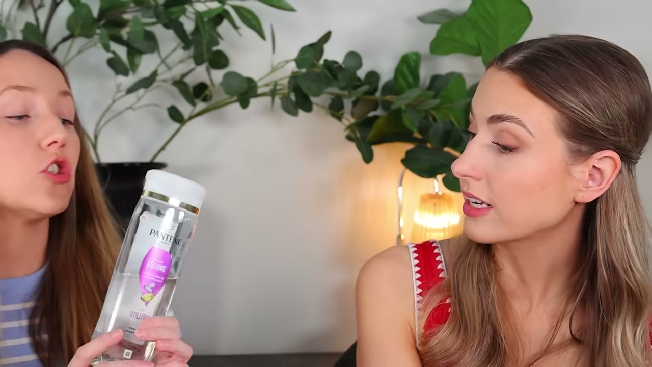 @rachhloves reviewing Pantene Sheer Volume Shampoo at 21:51 in a YouTube Shorts video