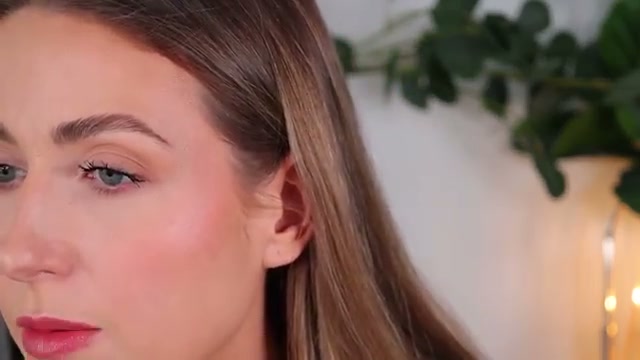 @rachhloves reviewing Rare Beauty Soft Pinch Lip Oil Stick at 18:30 in a YouTube Shorts video