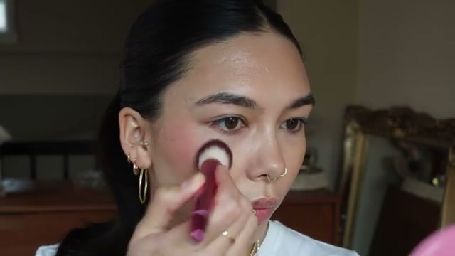 @rainiercramer reviewing The Creme Shop Cream Blush at 08:34 in a YouTube Shorts video