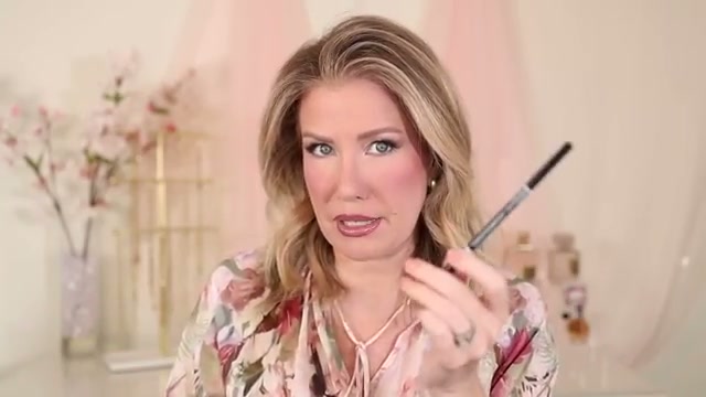 @risadoesmakeup reviewing CoverGirl Ultimate Brow Pencil at 21:04 in a YouTube Shorts video