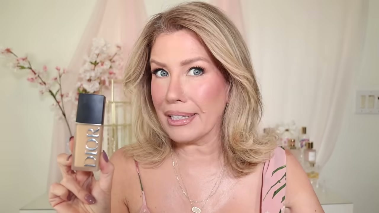 @risadoesmakeup reviewing Dior Forever Skinwear 24hr Foundation at 01:13 in a YouTube Shorts video