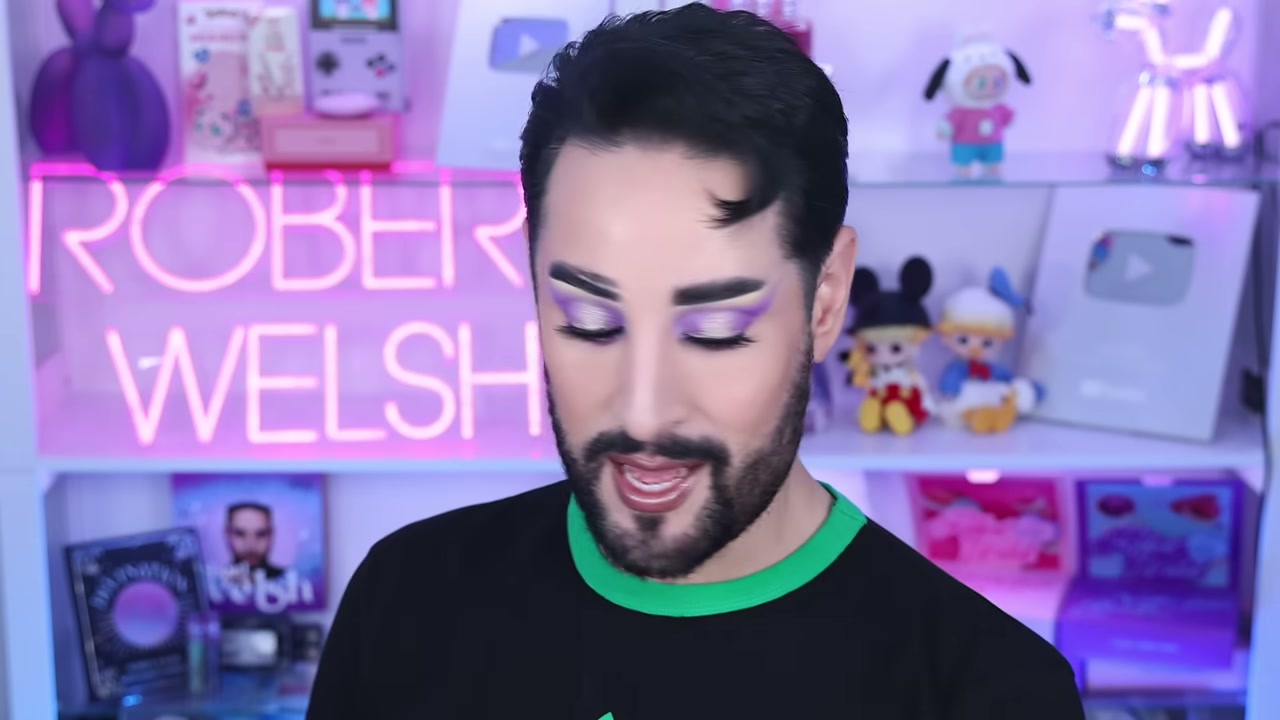 @robertwelsh reviewing Half Magic Magic Drip Glitter Lip Gloss at 16:54 in a YouTube Shorts video