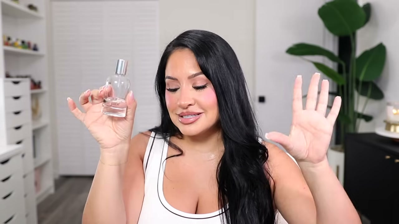@rositaapplebum reviewing By Rosie Jane Rosie Perfume at 12:20 in a YouTube Shorts video