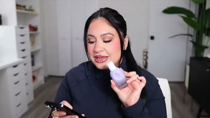@rositaapplebum reviewing Glossier You Fleur at 12:04 in a YouTube Shorts video