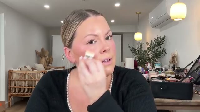 @selenamup reviewing Clé De Peau Celestial Sparks Illuminizer at 13:47 in a YouTube Shorts video