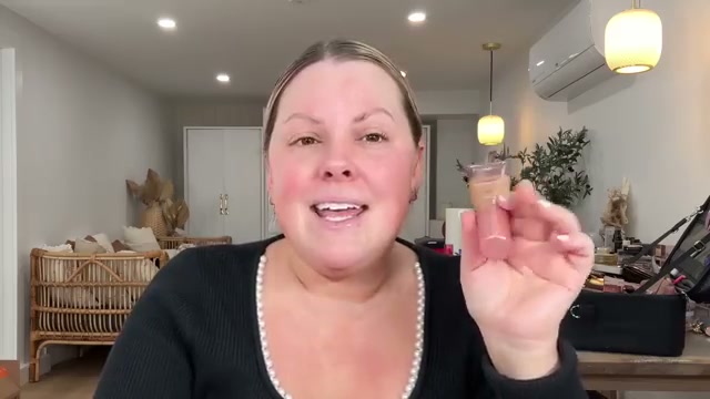 @selenamup reviewing L'Oreal Paris Lumi Foundation at 01:57 in a YouTube Shorts video