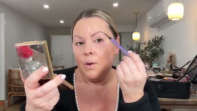 @selenamup reviewing Urban Decay Brow Pencil at 07:12 in a YouTube Shorts video