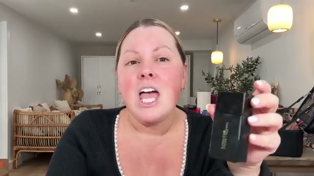 @selenamup reviewing Victoria Beckham Beauty Foundation Drops at 01:44 in a YouTube Shorts video