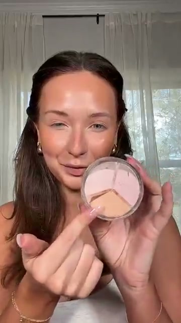 @shelbyannbell reviewing Hard Candy Blur On Lock Setting Powder at 00:24 in a YouTube Shorts video
