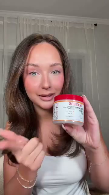 @shelbyannbell reviewing Thayers Exfoliating 2% AHA Face Pads with Witch Hazel and 2% AHA at 00:03 in a YouTube Shorts video