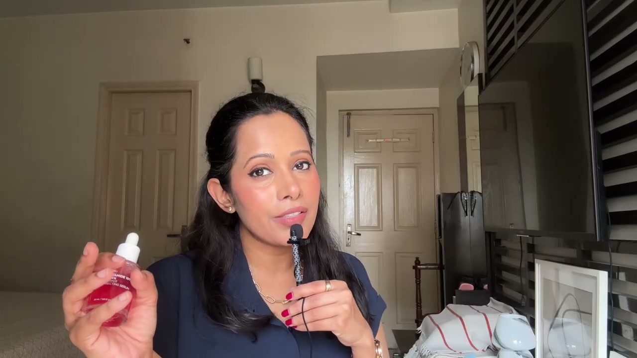 @shelleynayak reviewing Anoa Niacinamide Tranexamic Acid Dark Spot Correcting Serum at 04:08 in a YouTube Shorts video