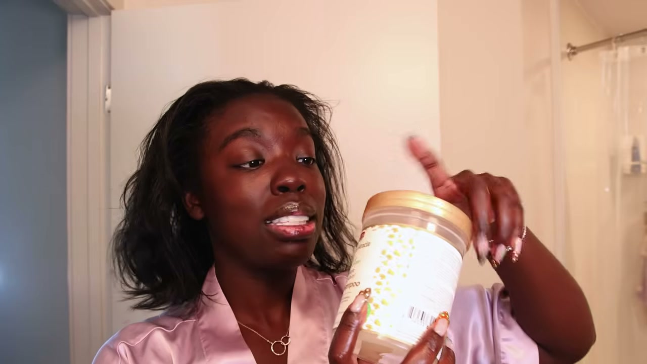 @simonenicole reviewing African Pride Miracle Pre-Poo at 07:21 in a YouTube Shorts video
