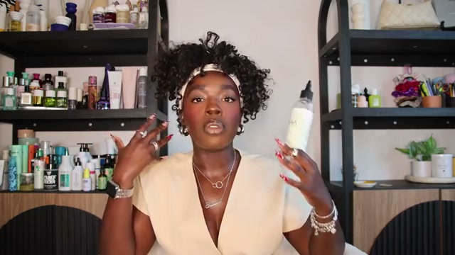 @simonenicole reviewing Nasara Organics Follicle & Strand Moisturizer at 14:46 in a YouTube Shorts video
