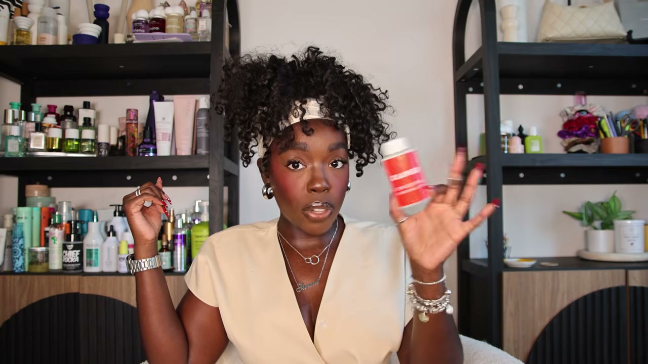 @simonenicole reviewing Olaplex No.3 Plus Complete Repair Treatment at 14:00 in a YouTube Shorts video