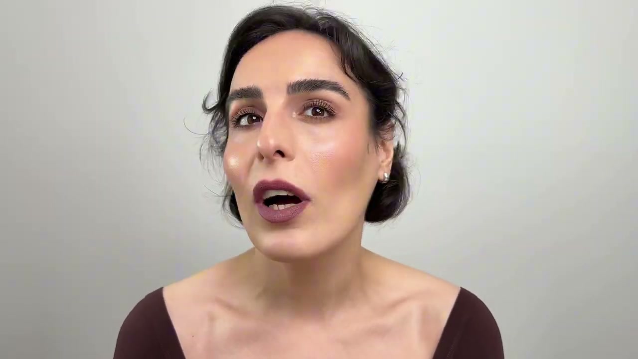 @simplybeautybyfatemeh-x8i reviewing Rabanne Dramalips Glassy Lipstick at 19:32 in a YouTube Shorts video