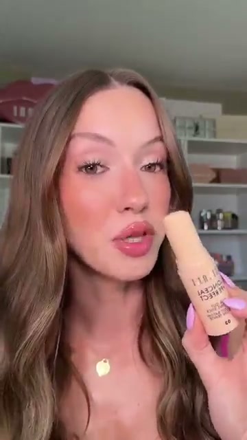 @skylerreneee reviewing Milani Conceal + Perfect Blur Out Skin Tint Stick at 01:10 in a YouTube Shorts video