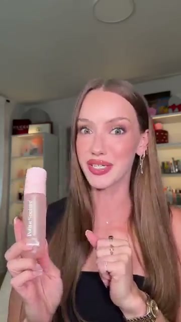 @skylerreneee reviewing Polite Society Moisturizing Glazing Mist at 02:55 in a YouTube Shorts video