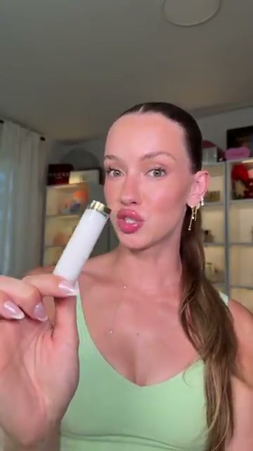 @skylerreneee reviewing Revlon Super Lustrous Shine Bombs at 01:41 in a YouTube Shorts video