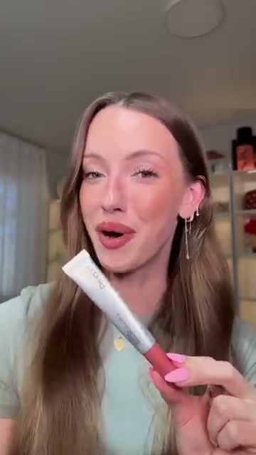 @skylerreneee reviewing Rhode Peptide Lip Boost at 00:39 in a YouTube Shorts video