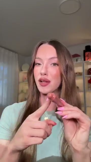 @skylerreneee reviewing Tower 28 Beauty LipSoftie Lip Treatment at 00:19 in a YouTube Shorts video