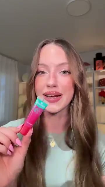 @skylerreneee reviewing Well People Poutlove Peptide Lip Balm at 00:09 in a YouTube Shorts video