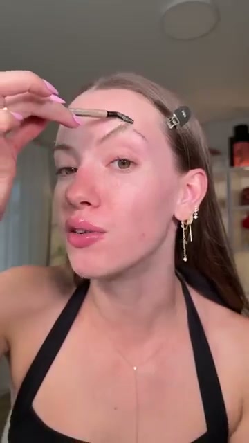 @skylerreneee reviewing Wet n Wild Mother Fluffer Cloud Blush at 00:12 in a YouTube Shorts video