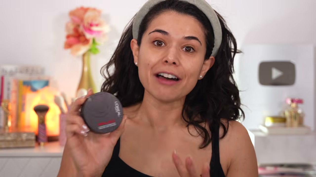@slashedbeauty reviewing L'Oreal Paris Infallible Fresh Wear Foundation at 01:11 in a YouTube Shorts video