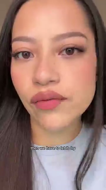 @slaybyjess reviewing One/Size Oil Sucker Liquid Blotting Spray at 00:40 in a YouTube Shorts video