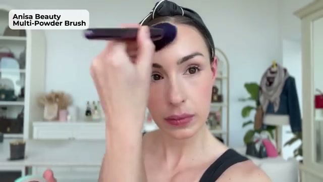 @sofiaseesbeauty reviewing ANISA Multi-Powder Brush at 15:34 in a YouTube Shorts video