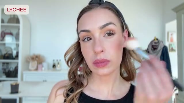 @sofiaseesbeauty reviewing Laura Mercier Blush Color Infusion at 14:06 in a YouTube Shorts video