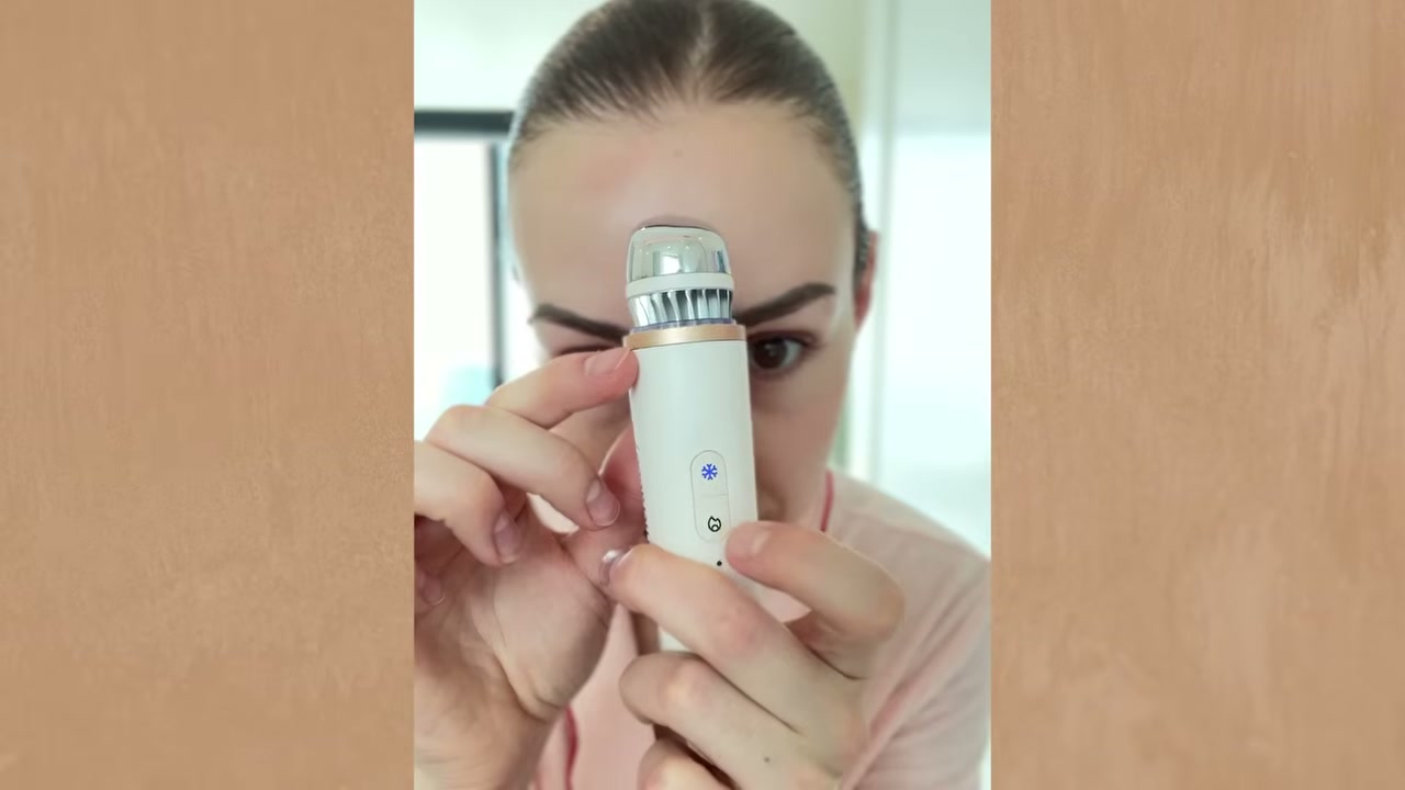 @sofiaseesbeauty reviewing Therabody TheraFace Depuffing Wand at 25:30 in a YouTube Shorts video
