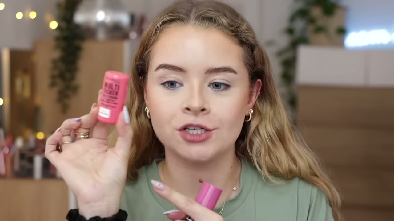 @sophdoeslife reviewing Rimmel Multitasker Jelly Crush Lip and Cheek Tint at 08:19 in a YouTube Shorts video