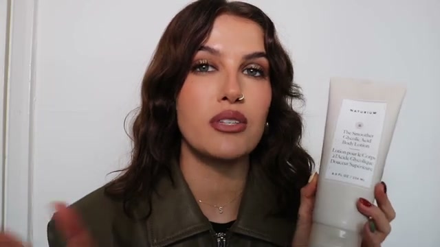 @sophiefloyd reviewing Naturium Smoother Glycolic Acid Body Lotion at 05:58 in a YouTube Shorts video