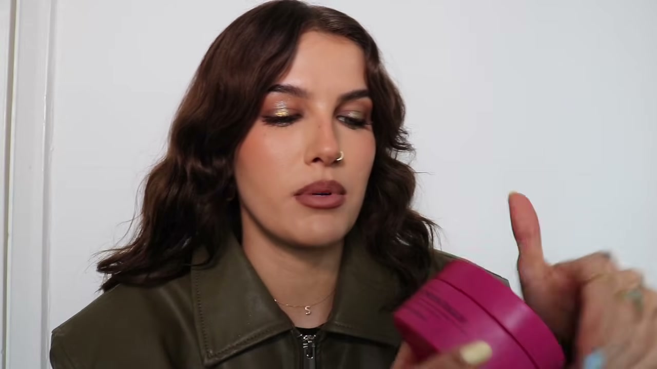 @sophiefloyd reviewing Skin Rocks Cleansing Balm at 03:10 in a YouTube Shorts video
