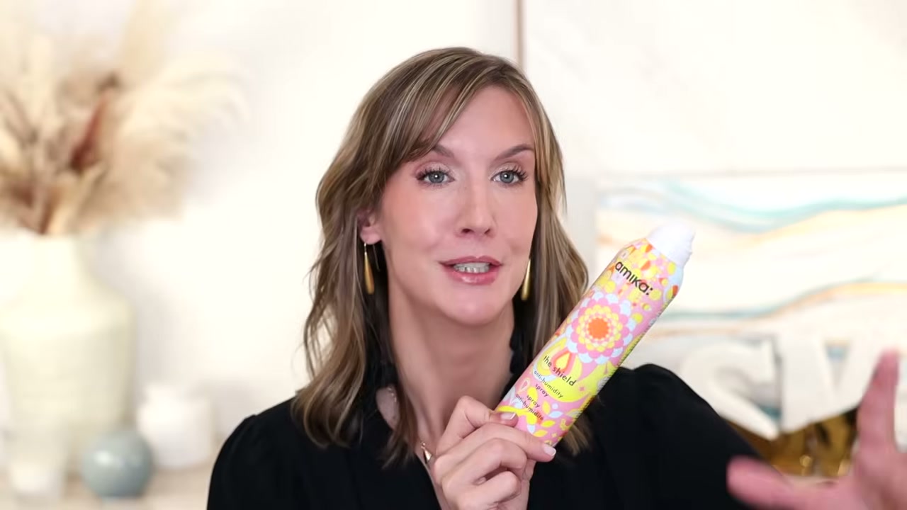 @stephaniemarie reviewing amika The Shield Anti-Humidity Spray at 15:05 in a YouTube Shorts video