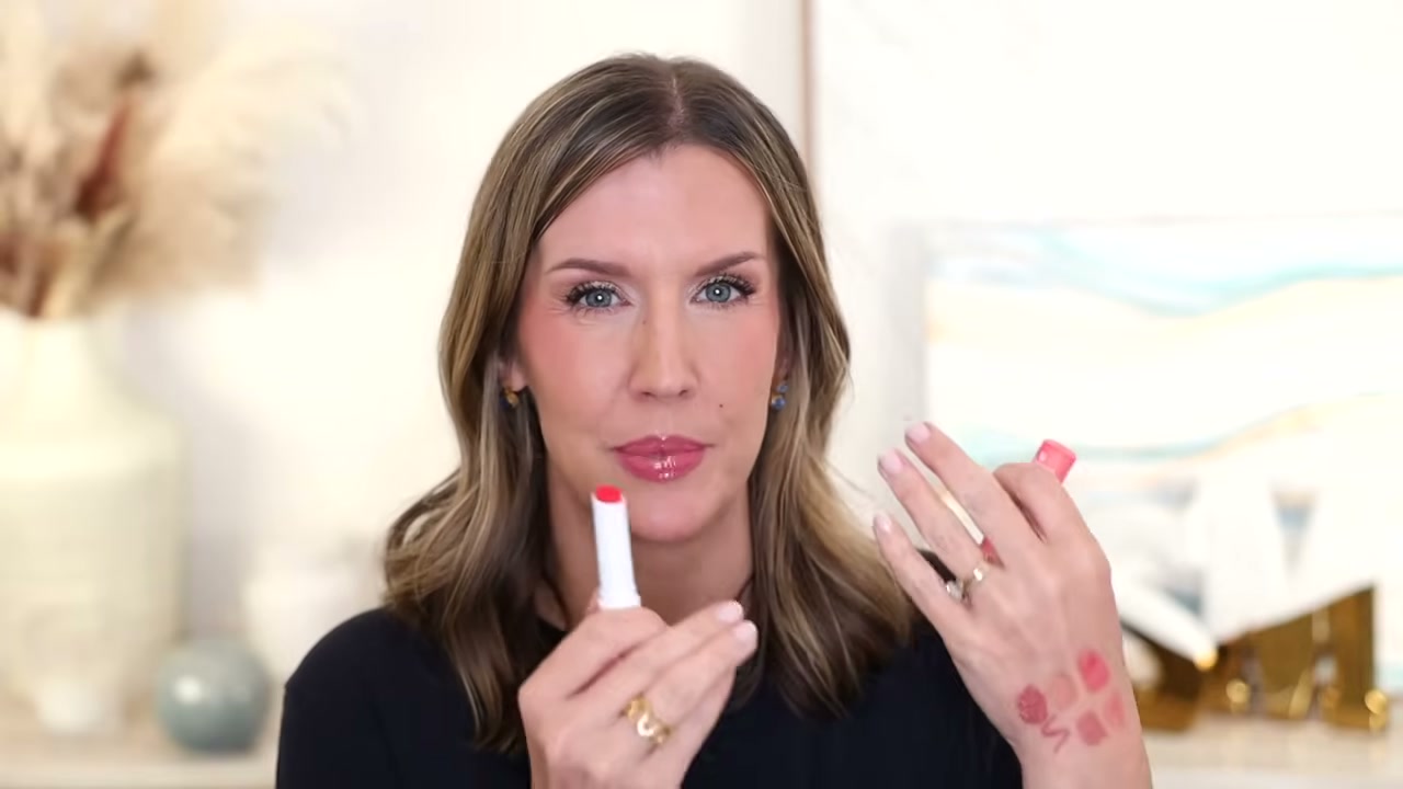 @stephaniemarie reviewing Essence Juicy Balm Glossy Butter Balm at 30:02 in a YouTube Shorts video