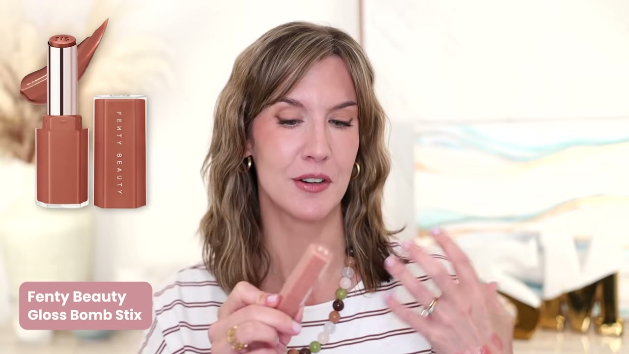@stephaniemarie reviewing Fenty Beauty Gloss Bomb Stix at 17:16 in a YouTube Shorts video