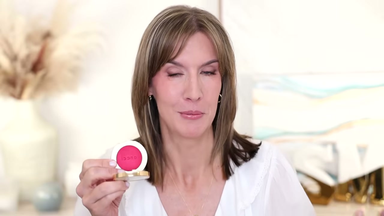 @stephaniemarie reviewing Gucci Glow Dewy Powder Blush at 05:29 in a YouTube Shorts video