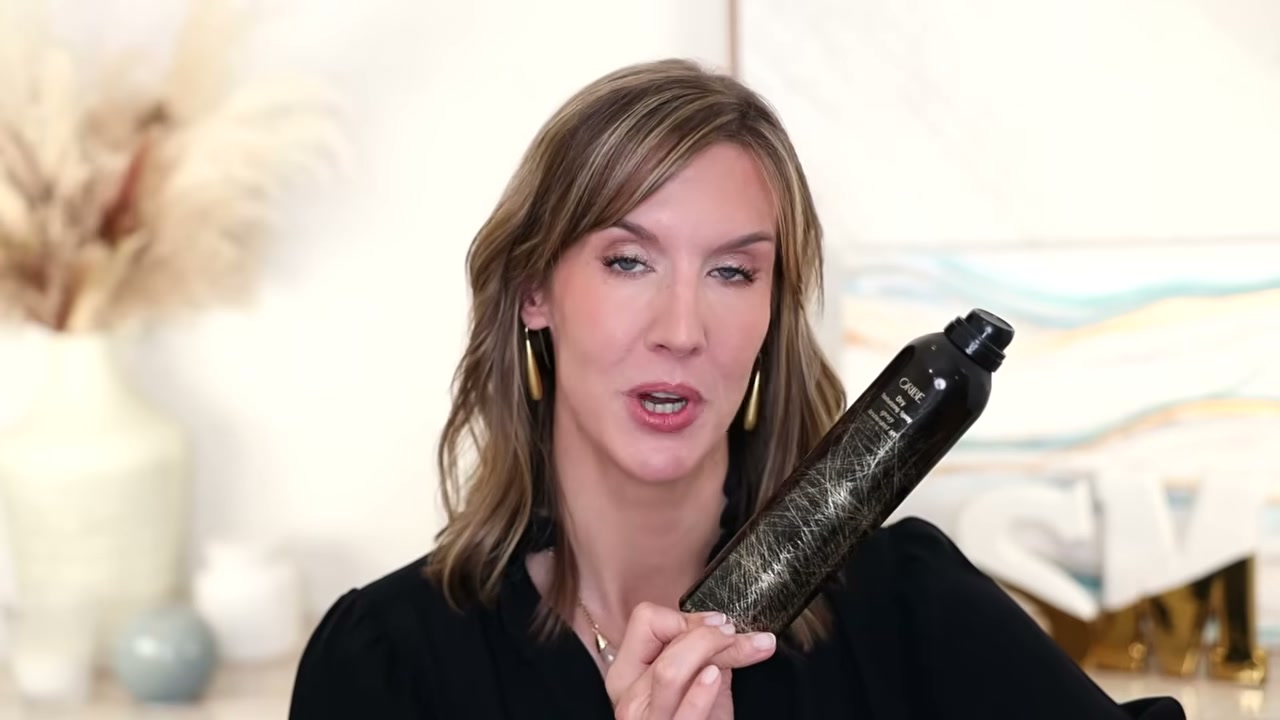 @stephaniemarie reviewing Oribe Dry Texturizing Spray at 14:28 in a YouTube Shorts video