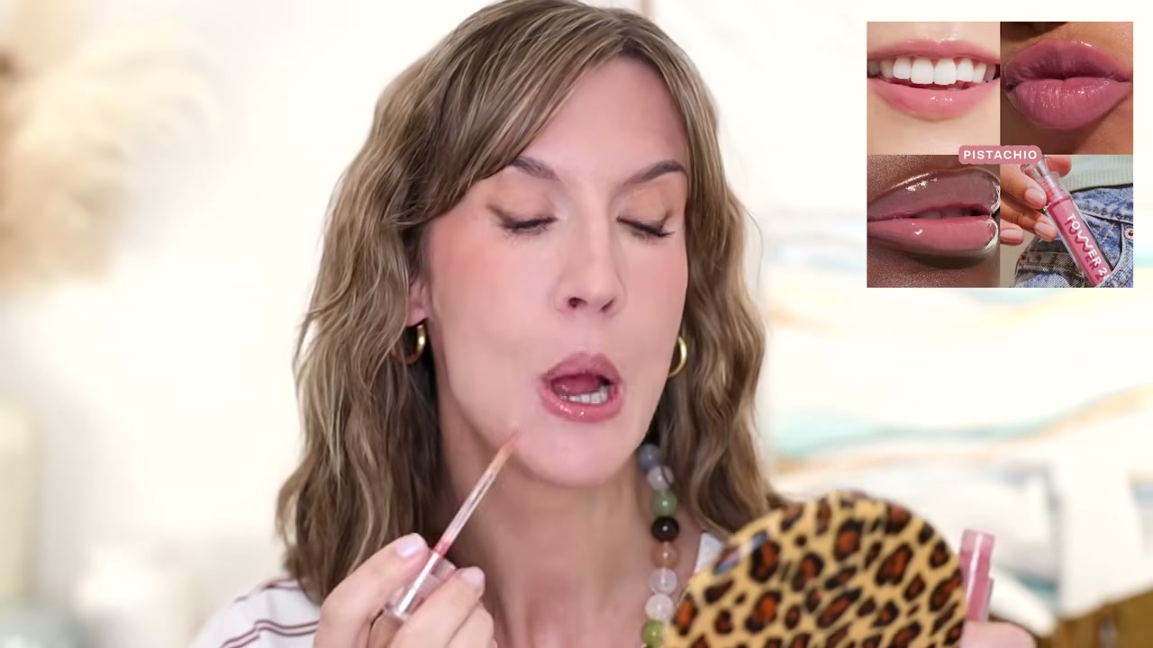 @stephaniemarie reviewing Tower 28 Beauty Shineon Lip Jelly Hydrating Non-Sticky Lip Oil at 14:00 in a YouTube Shorts video