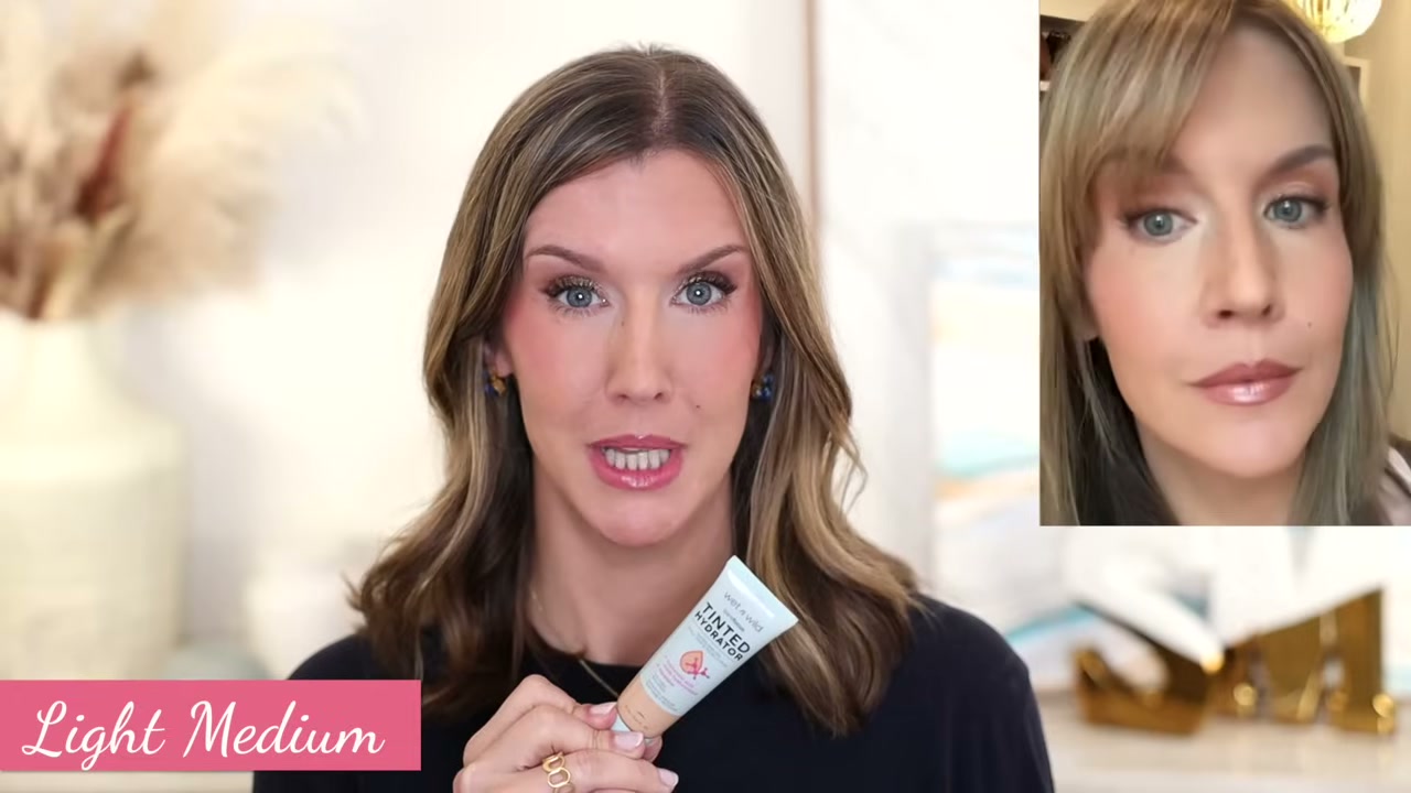 @stephaniemarie reviewing Wet n Wild Bare Focus Tinted Hydrator at 04:09 in a YouTube Shorts video