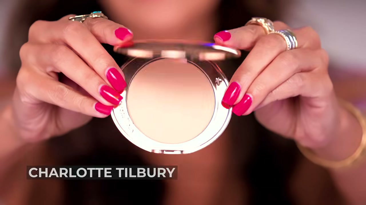 @tati reviewing Charlotte Tilbury Airbrush Flawless Blurring & Setting Powder at 08:35 in a YouTube Shorts video